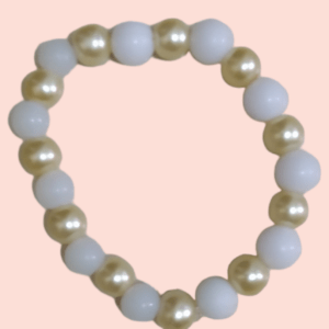 A white and gold bracelet