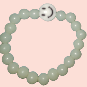 A White Bracelet With A Happy Face