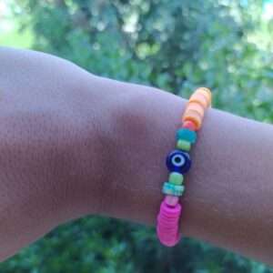 A Colourful Rubber Bracelet With An Eye
