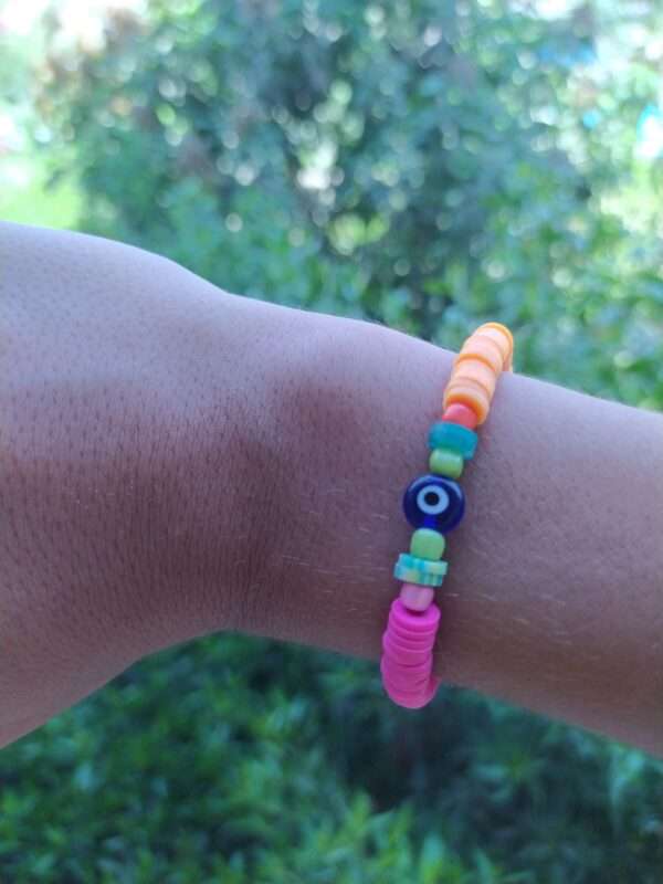 A Colourful Rubber Bracelet With An Eye